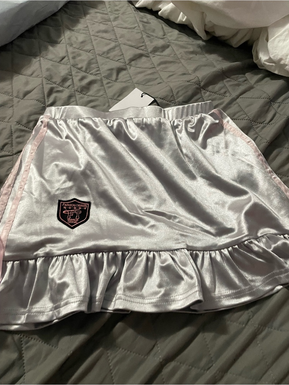 AKIRA Silver Satin Mini Skirt with Pink Trim